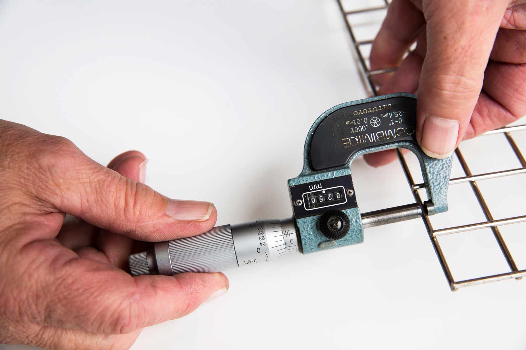 micrometer measuring stainless steel wire diameter